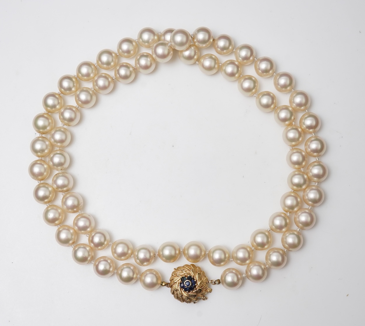 A simulant pearl, gold and sapphire necklace, 1960s
